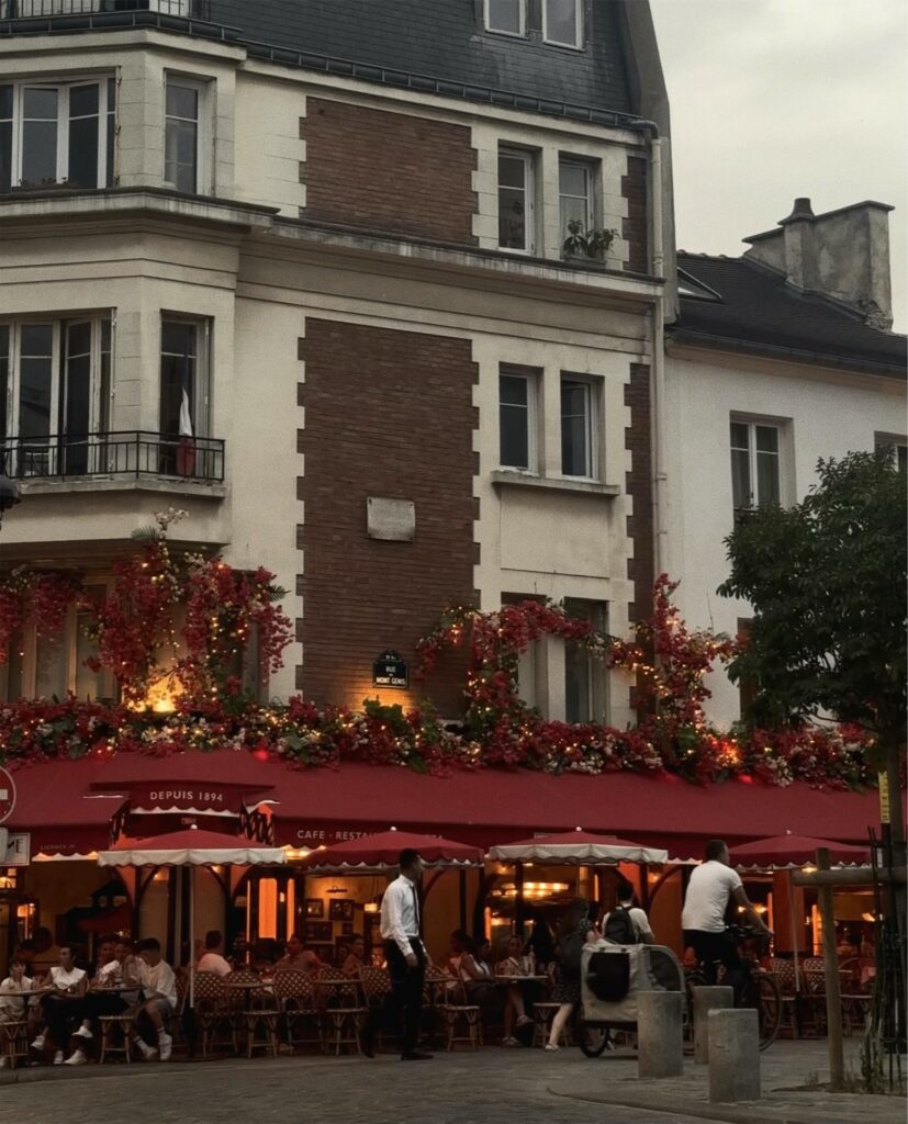 cafe creme red awnings paris cafe