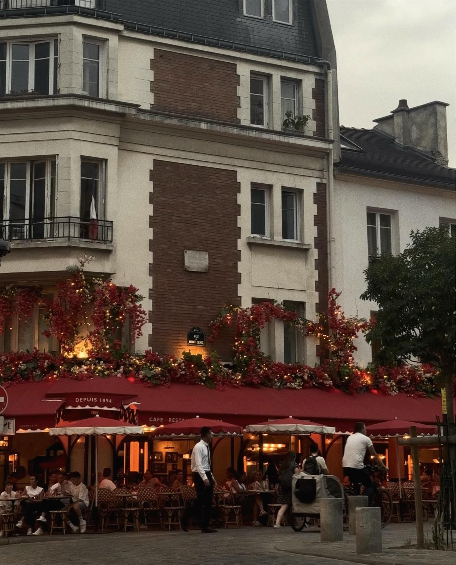 cafe creme red awnings paris cafe